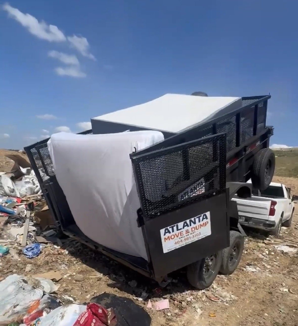 Atlanta Move & Dump dump trailer at the landfill